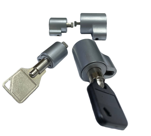 Barrel locks in housings slim and normal with keys.